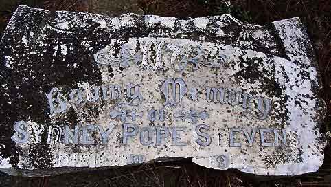 Image of fragment of headstone.