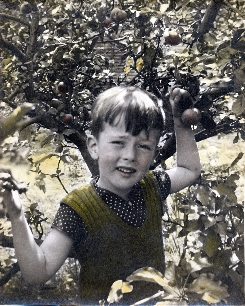 Image of Philip under the apple tree.